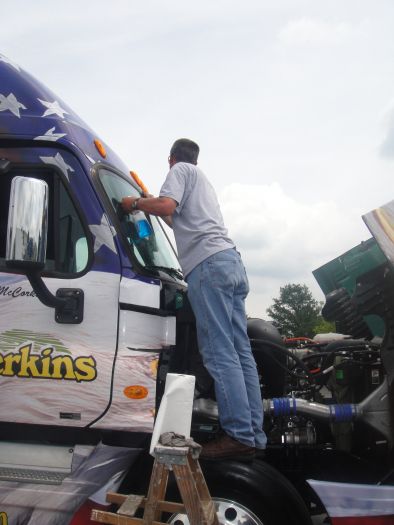 Henry_cleaning_Dicks_Windshield.JPG