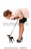 stock-photo-pretty-young-woman-holding-a-black-chihuahua-on-a-leash-124860535.jpg